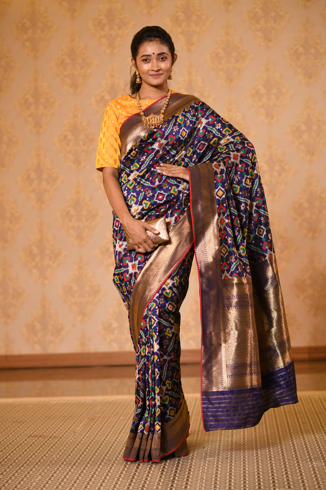 Trendy Navy Patola Silk Saree with mesmerizing Zari Border