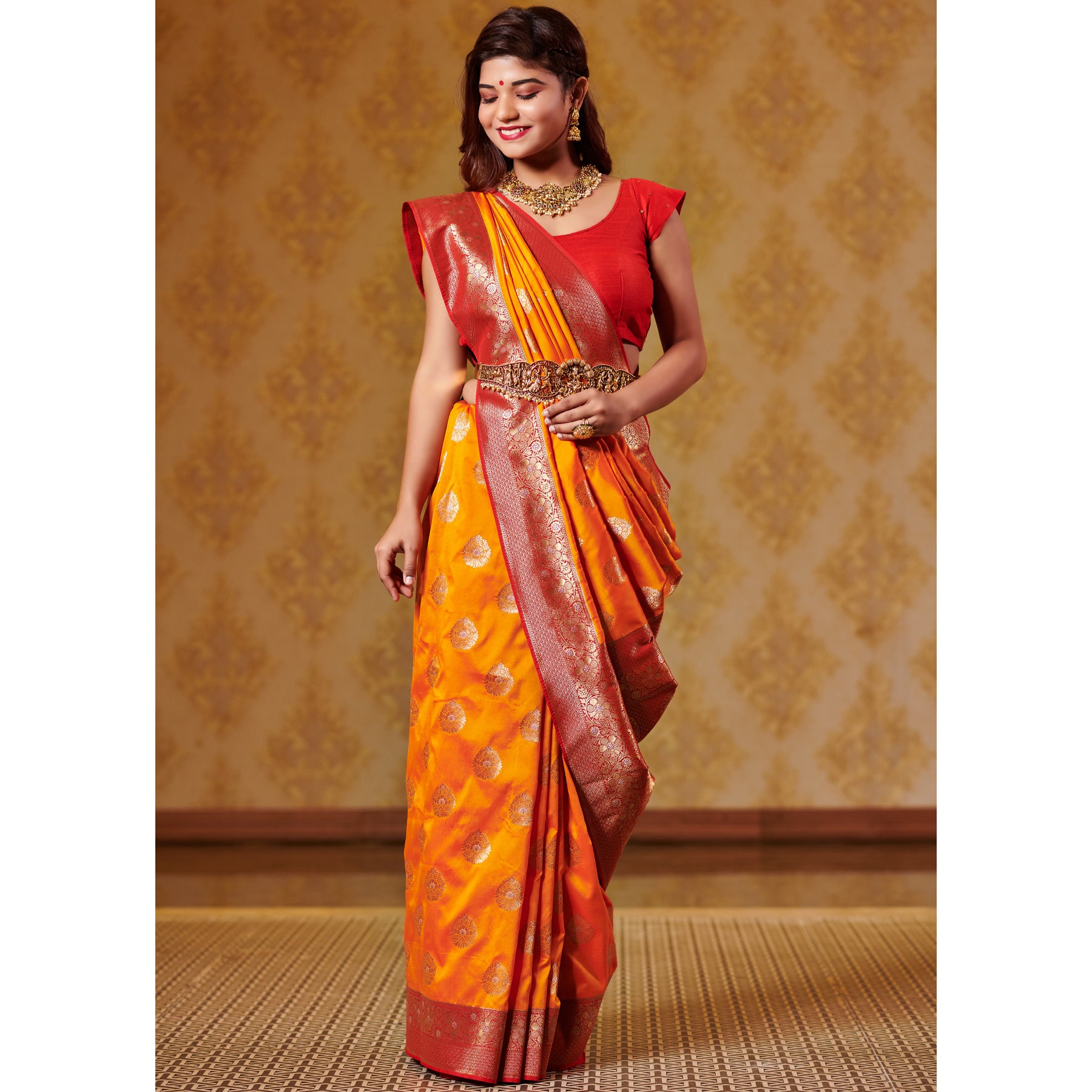 Kesar and Red Saree with Zari Bootas and Heavy Border Saree