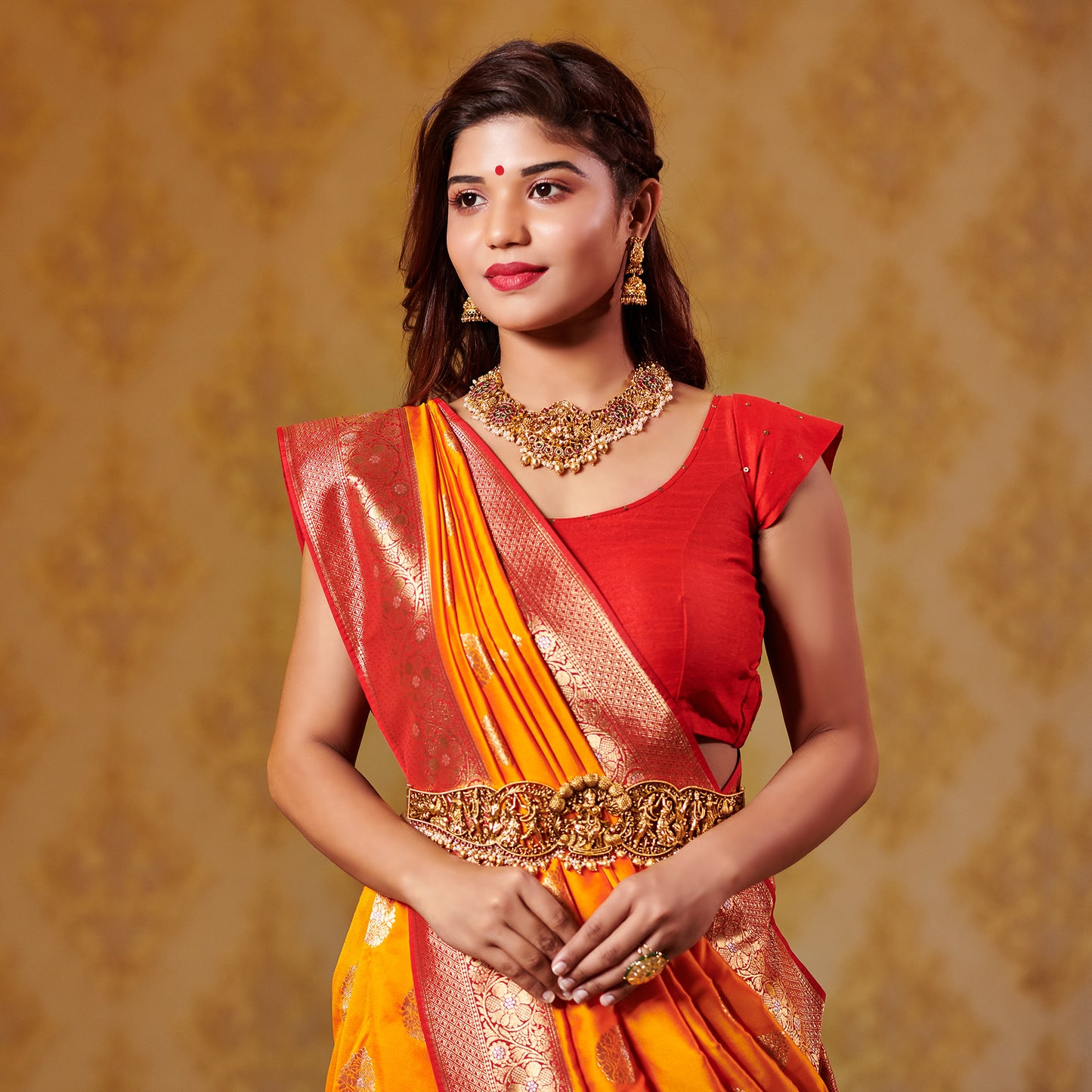 Kesar and Red Saree with Zari Bootas and Heavy Border Saree