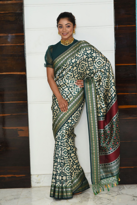 Green patola silk saree with Ikkat Pattern Saree