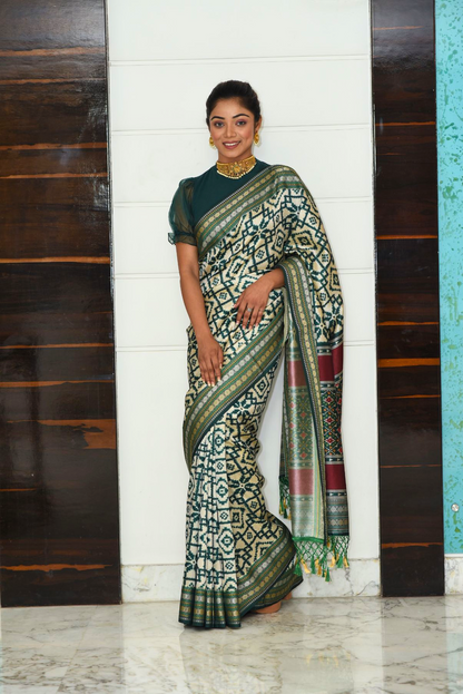 Green patola silk saree with Ikkat Pattern Saree