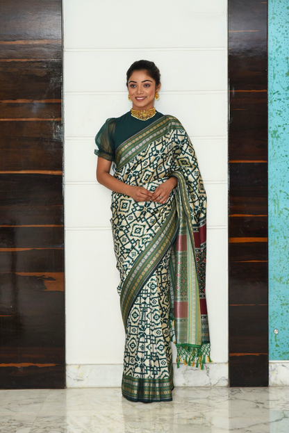 Green patola silk saree with Ikkat Pattern Saree