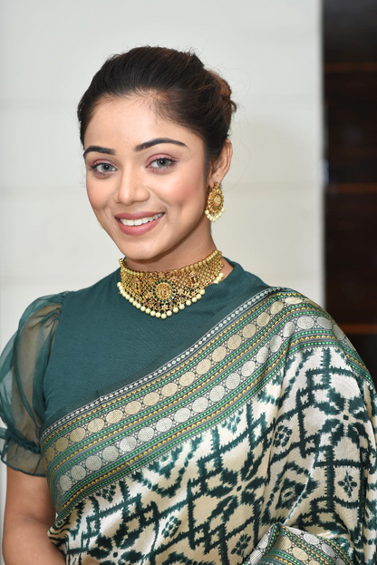 Green patola silk saree with Ikkat Pattern Saree